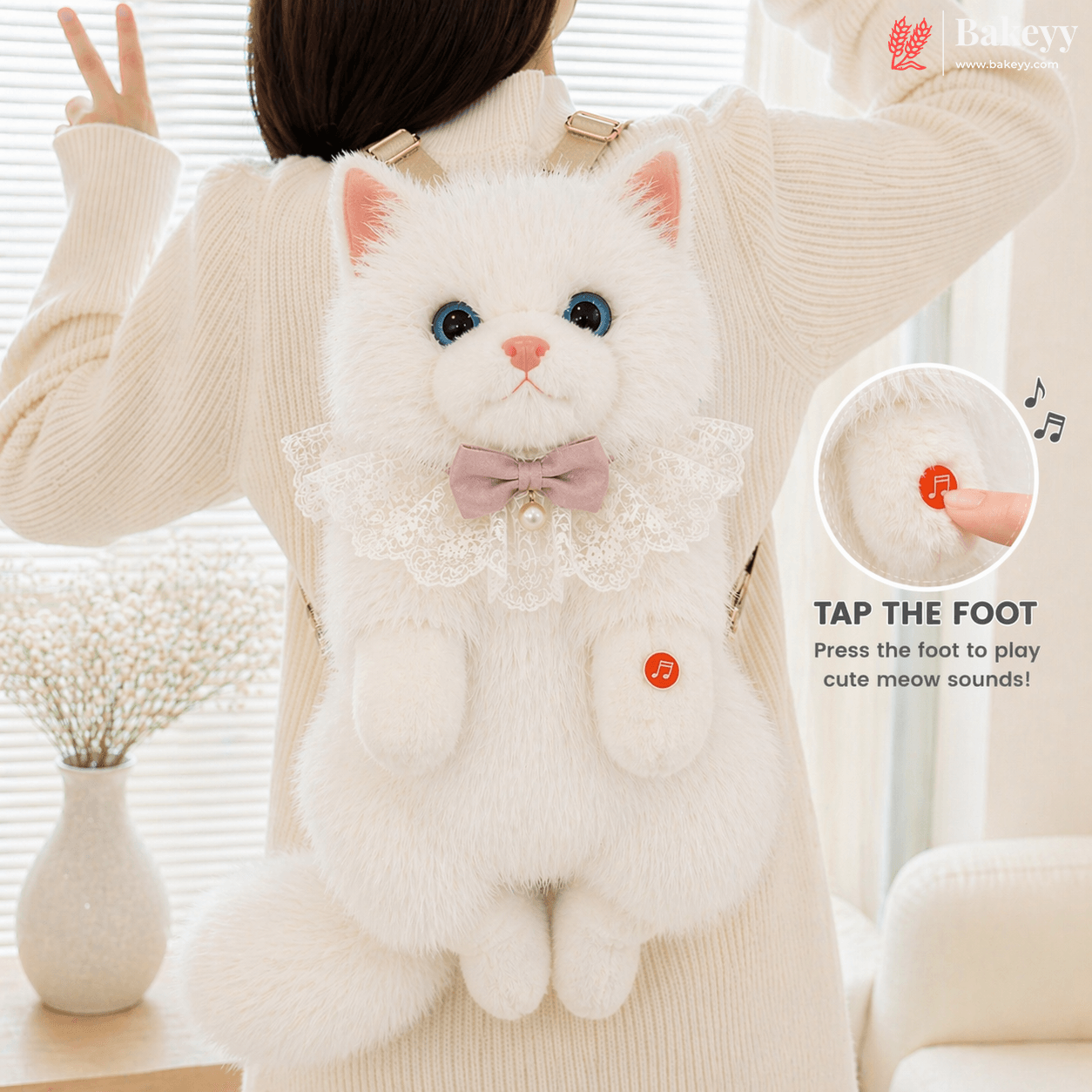 White plush cat toy with a bow on a person's back, with a close-up of the toy's foot and sound control.
Cute Plush Cat Backpack | Meow Sound Interactive | Wearable Storage Soft Backpack Toy | Pack of 1