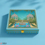 Decorative box with garden design featuring peacocks and a fountain on a blue background